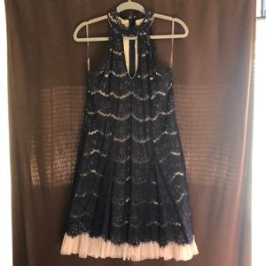 Francesca’s navy lace dress